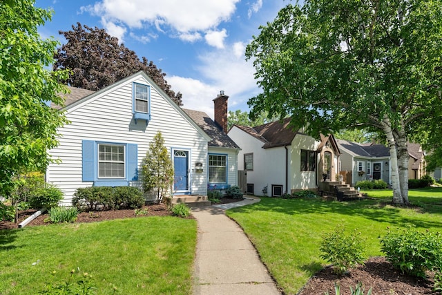 5341 Knox Ave S, Minneapolis, MN 55419 - view of front of house featuring a front lawn and a chimney