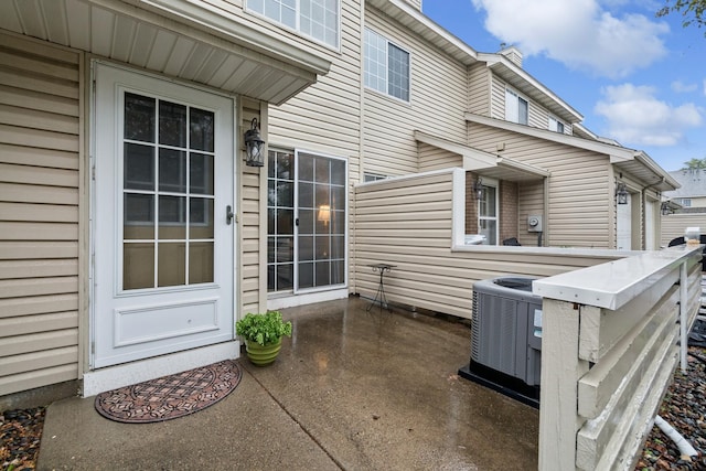 13210 Meadowood Trl NW Unit 63Nw, Coon Rapids, MN 55448 - view of patio featuring central air condition unit