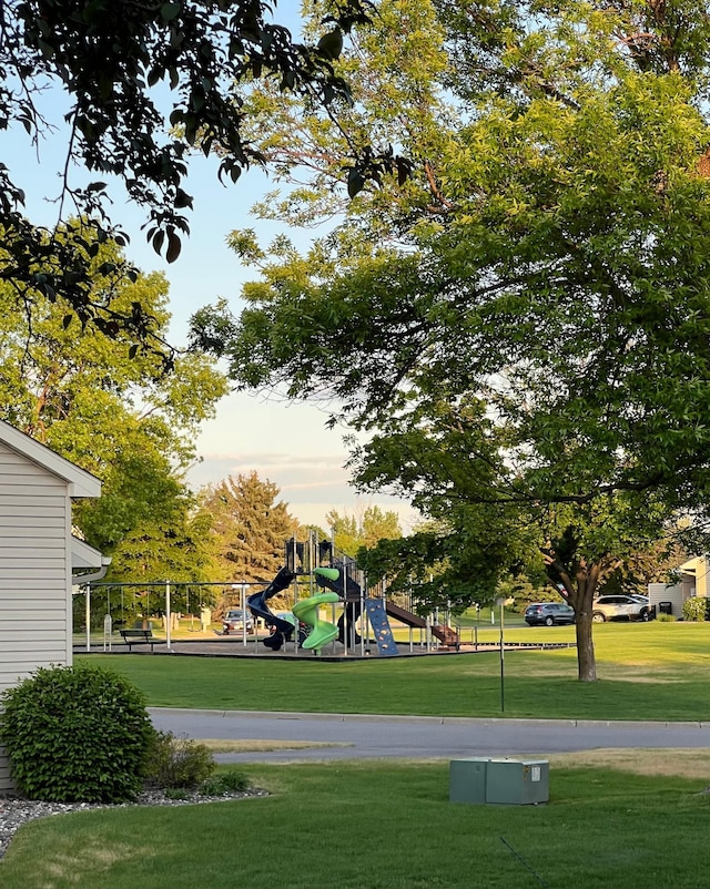 13210 Meadowood Trl NW Unit 63Nw, Coon Rapids, MN 55448 - community play area featuring a yard
