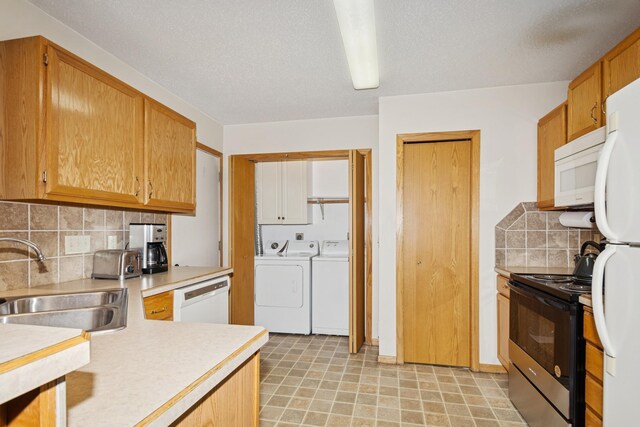 13210 Meadowood Trl NW Unit 63Nw, Coon Rapids, MN 55448 - kitchen with white appliances, light countertops, decorative backsplash, independent washer and dryer, and light flooring