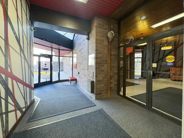 26 10th St W Unit 1701, Saint Paul, MN 55102 - common area featuring brick wall and wood ceiling