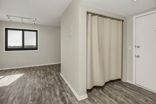 26 10th St W Unit 1701, Saint Paul, MN 55102 - empty room featuring wood finished floors and baseboards