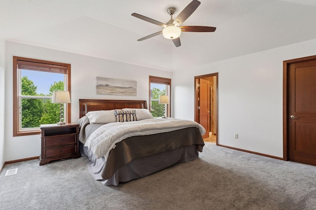 11200 Walnut Ln, Woodbury, MN 55129 - bedroom with light carpet, baseboards, and a ceiling fan