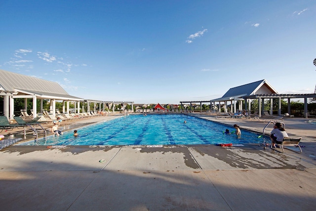 11200 Walnut Ln, Woodbury, MN 55129 - community pool featuring a patio and a pergola