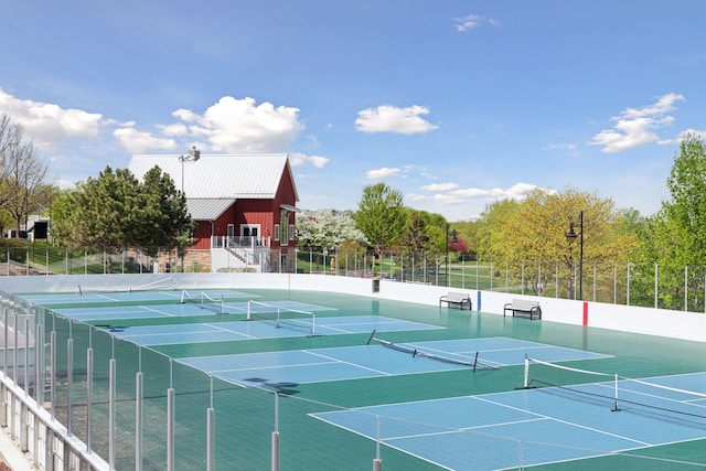 11200 Walnut Ln, Woodbury, MN 55129 - view of tennis court with community basketball court