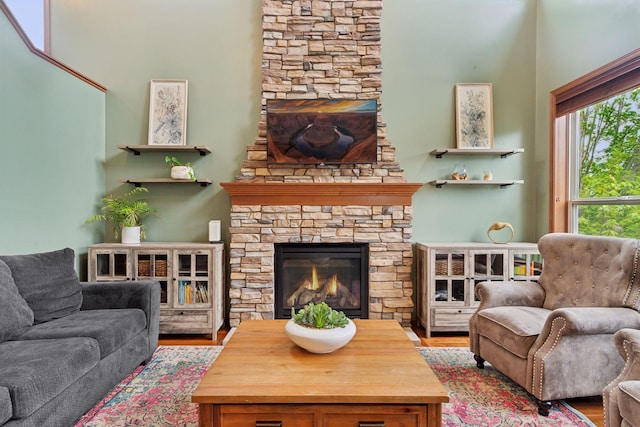 11200 Walnut Ln, Woodbury, MN 55129 - living room with a fireplace and wood finished floors