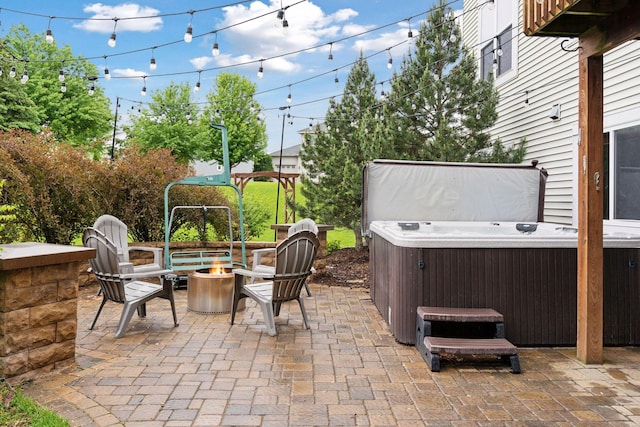 11200 Walnut Ln, Woodbury, MN 55129 - view of patio / terrace with a hot tub and a fire pit