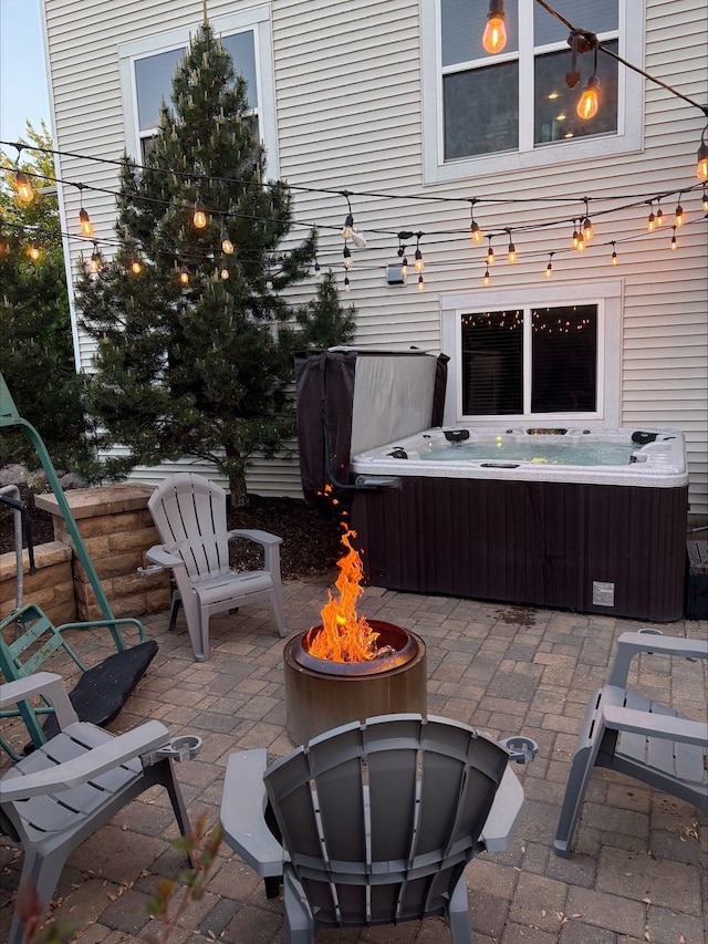 11200 Walnut Ln, Woodbury, MN 55129 - view of patio / terrace with a hot tub and an outdoor fire pit