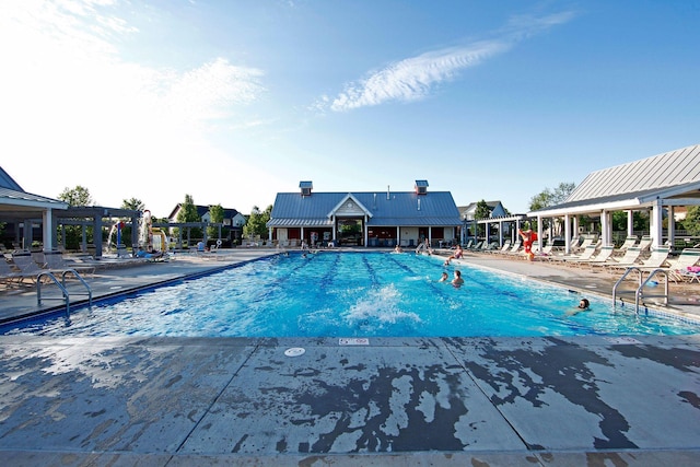 11200 Walnut Ln, Woodbury, MN 55129 - community pool with a patio