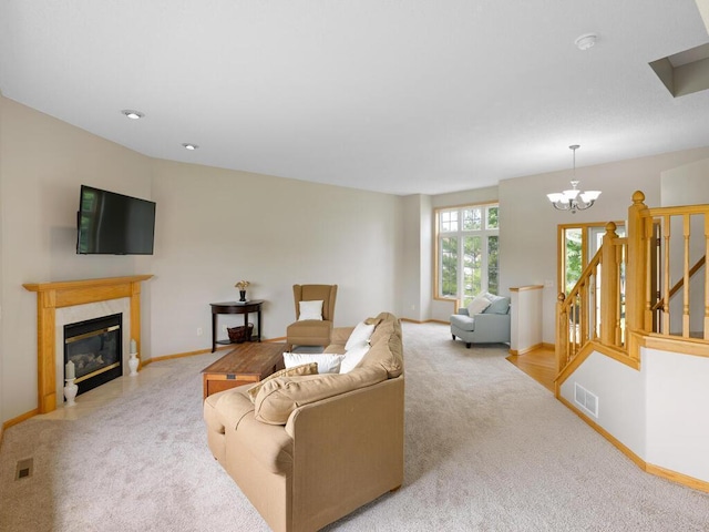 6700 210th Lane Cir N, Forest Lake, MN 55025 - carpeted living room with a chandelier and a premium fireplace