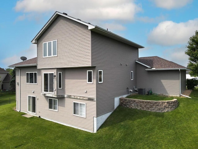 6700 210th Lane Cir N, Forest Lake, MN 55025 - rear view of house featuring a yard