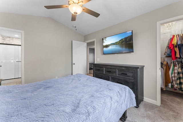1120 7th Ave NE, Isanti, MN 55040 - carpeted bedroom featuring a walk in closet, a closet, vaulted ceiling, ceiling fan, and ensuite bathroom