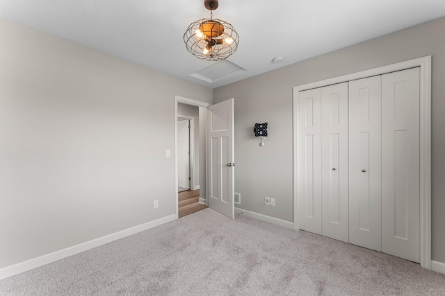 1120 7th Ave NE, Isanti, MN 55040 - unfurnished bedroom with carpet and a closet