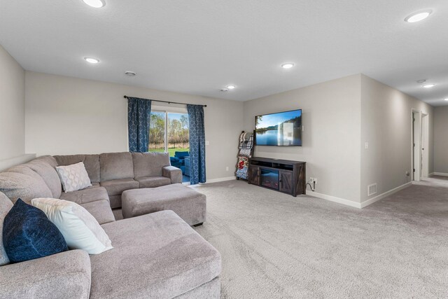 1120 7th Ave NE, Isanti, MN 55040 - living room with carpet floors and recessed lighting