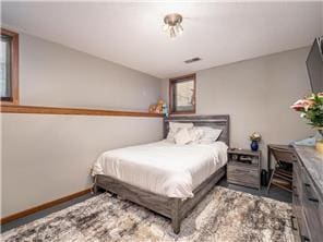 1555 Bluebird Ln, Mound, MN 55364 - bedroom featuring wood finished floors and baseboards