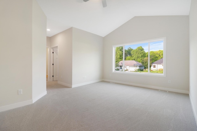 31079 Magnolia Ridge Way, Lindstrom, MN 55045 - spare room with light colored carpet, baseboards, ceiling fan, vaulted ceiling, and recessed lighting
