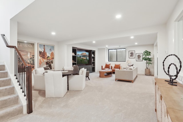10320 Peony Ln N, Maple Grove, MN 55311 - living room featuring recessed lighting, light colored carpet, and stairway
