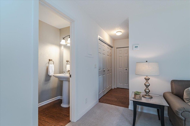 13721 Inglewood Ave, Savage, MN 55378 - hallway with baseboards and wood finished floors