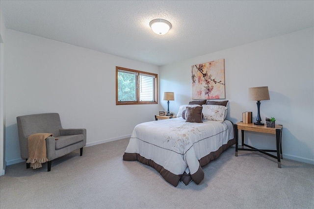 13721 Inglewood Ave, Savage, MN 55378 - carpeted bedroom featuring a textured ceiling and baseboards