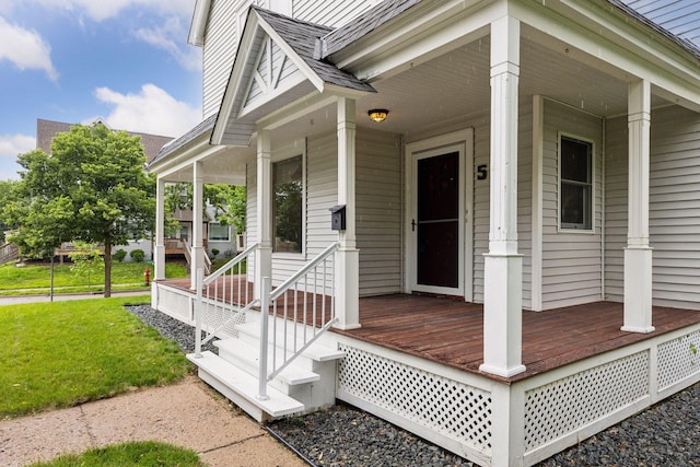 518 32nd St, Minneapolis, MN 55408 - view of exterior entry with a porch and a yard