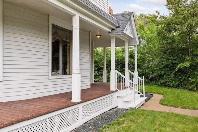 518 32nd St, Minneapolis, MN 55408 - wooden porch featuring a lawn