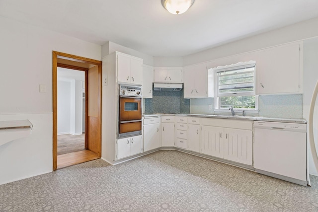 518 32nd St, Minneapolis, MN 55408 - kitchen with dishwasher, oven, a warming drawer, range hood, and decorative backsplash