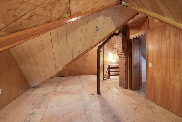 518 32nd St, Minneapolis, MN 55408 - bonus room featuring wood walls and stairs