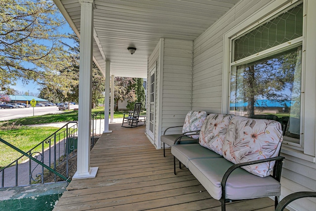 deck featuring covered porch