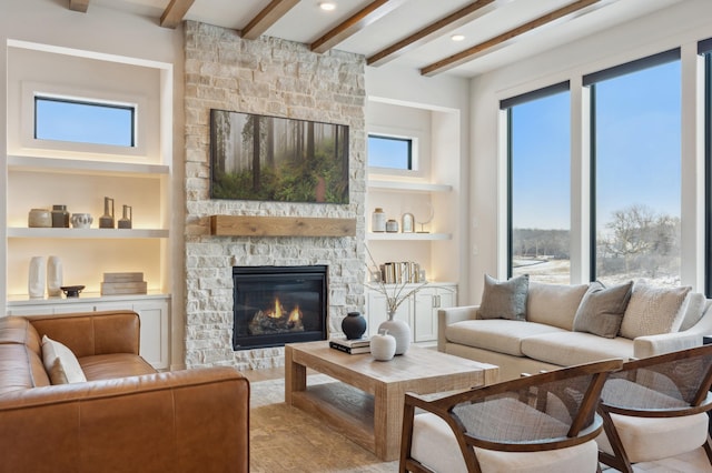 10382 Peony Ln N, Maple Grove, MN 55311 - living area featuring a stone fireplace, beamed ceiling, built in features, and wood finished floors