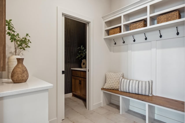 10382 Peony Ln N, Maple Grove, MN 55311 - mudroom featuring baseboards