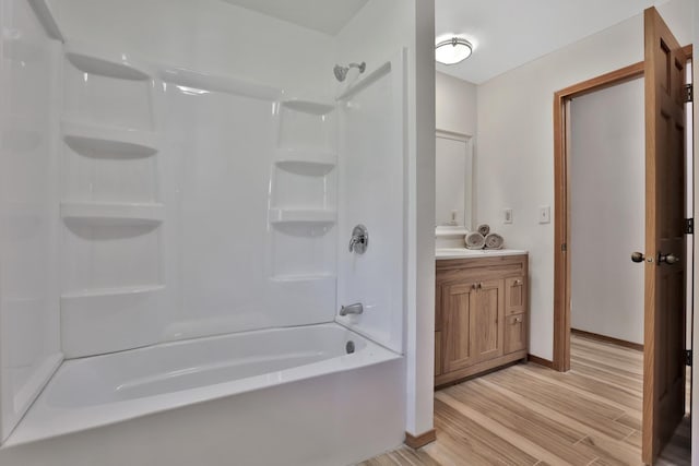 30145 Fir Trl, Stacy, MN 55079 - bathroom featuring wood finished floors, vanity, and shower / bathtub combination