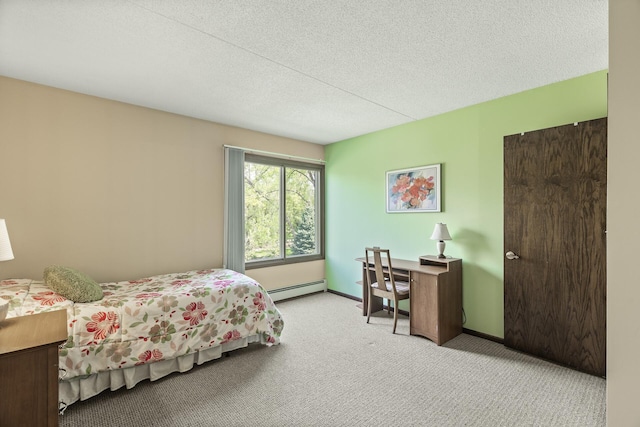 2465 Londin Ln E Unit 212, Maplewood, MN 55119 - bedroom featuring a baseboard radiator, carpet, a textured ceiling, and baseboards