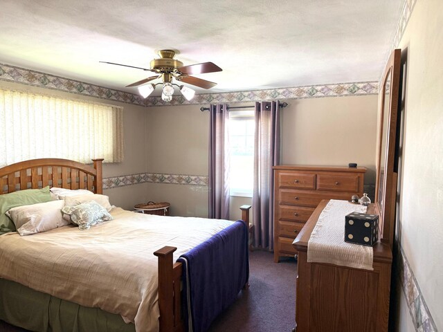 bedroom featuring carpet floors and a ceiling fan