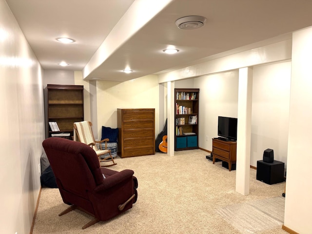 carpeted living room with recessed lighting and baseboards