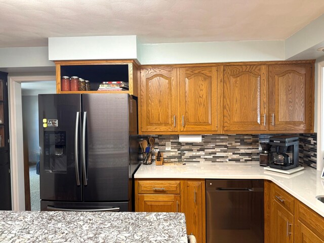 kitchen with stainless steel fridge with ice dispenser, dishwasher, brown cabinets, and decorative backsplash