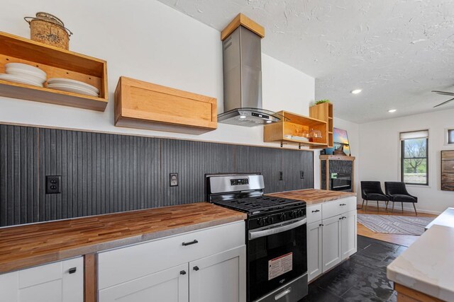 20355 Cedar Lake Trl, Shieldsville Twp, MN 55052 - kitchen with stainless steel gas stove, wooden counters, open shelves, ventilation hood, and white cabinetry
