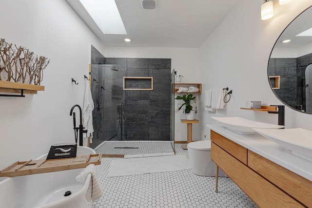 20355 Cedar Lake Trl, Shieldsville Twp, MN 55052 - bathroom with tiled shower, vanity, a soaking tub, toilet, and recessed lighting