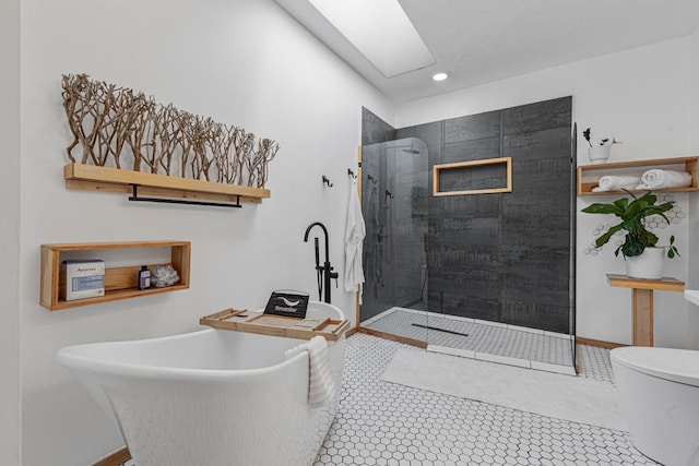20355 Cedar Lake Trl, Shieldsville Twp, MN 55052 - full bathroom featuring a walk in shower, a freestanding bath, recessed lighting, toilet, and baseboards