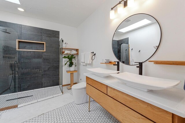 20355 Cedar Lake Trl, Shieldsville Twp, MN 55052 - full bathroom with tiled shower, toilet, tile patterned floors, double vanity, and recessed lighting