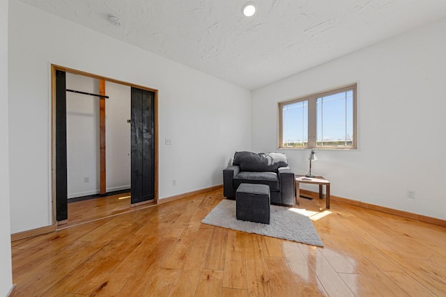 20355 Cedar Lake Trl, Shieldsville Twp, MN 55052 - sitting room featuring light wood finished floors and baseboards