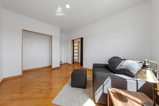 20355 Cedar Lake Trl, Shieldsville Twp, MN 55052 - living area featuring light wood-type flooring and baseboards