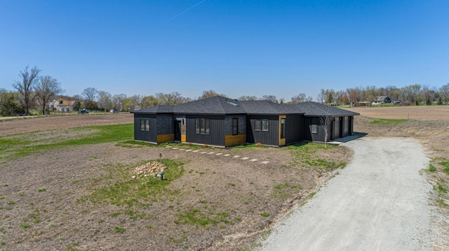 20355 Cedar Lake Trl, Shieldsville Twp, MN 55052 - prairie-style home with driveway and an attached garage
