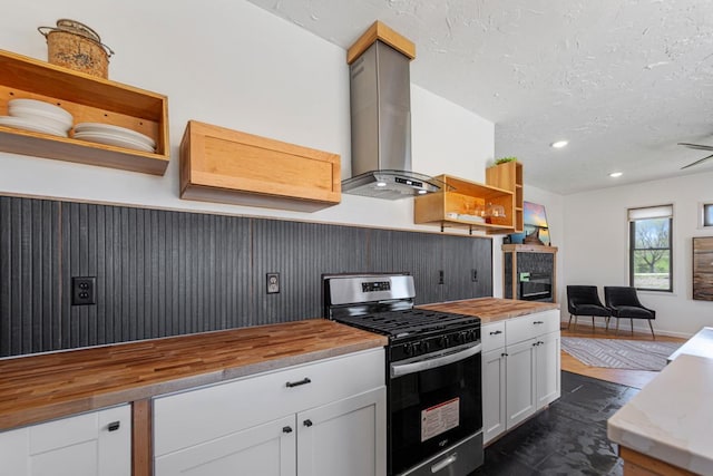 20355 Cedar Lake Trl, Shieldsville Twp, MN 55052 - kitchen featuring gas range, butcher block countertops, open shelves, wall chimney range hood, and white cabinetry