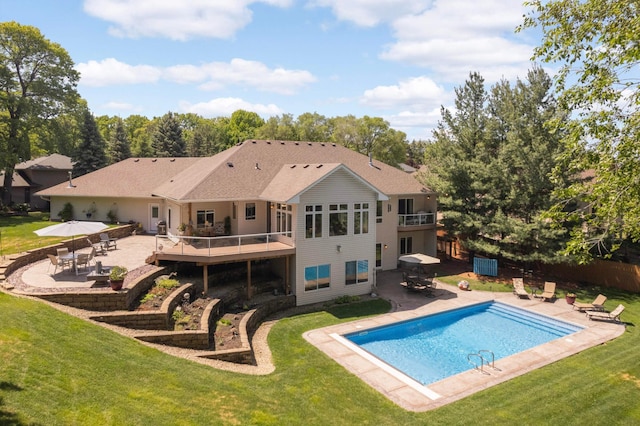 6209 Heather Pl NE, Fridley, MN 55432 - rear view of house with a patio and a wooden deck