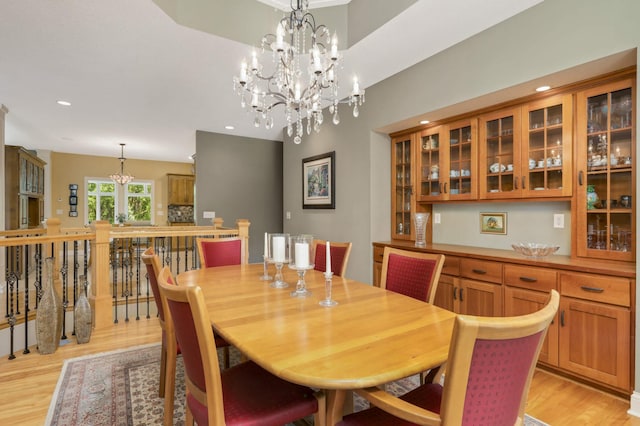6209 Heather Pl NE, Fridley, MN 55432 - dining room featuring a chandelier, light wood-style floors, and recessed lighting