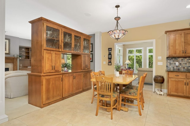 6209 Heather Pl NE, Fridley, MN 55432 - dining area with light tile patterned floors