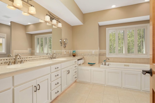 6209 Heather Pl NE, Fridley, MN 55432 - full bath featuring tile patterned floors, double vanity, and a bath