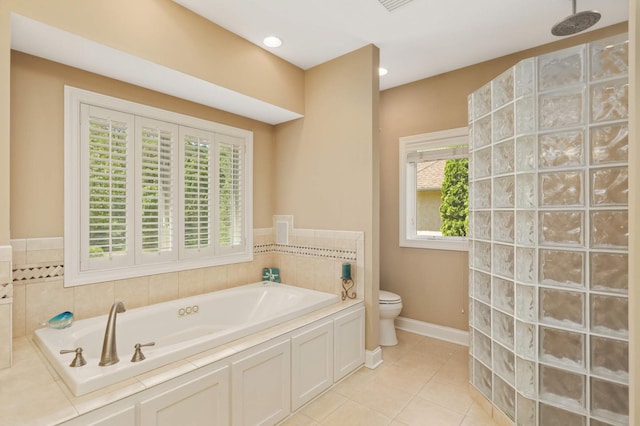 6209 Heather Pl NE, Fridley, MN 55432 - bathroom featuring toilet, a garden tub, healthy amount of natural light, a walk in shower, and recessed lighting