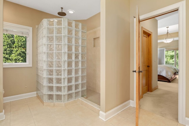 6209 Heather Pl NE, Fridley, MN 55432 - full bathroom featuring walk in shower, tile patterned floors, baseboards, and connected bathroom
