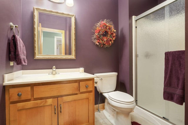 6209 Heather Pl NE, Fridley, MN 55432 - full bath with a shower stall, vanity, toilet, and tile patterned flooring